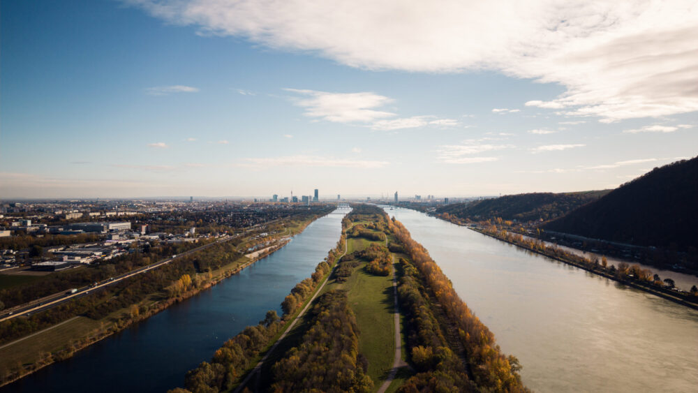 Vienna Danube Island landscape with green spaces and walking paths.