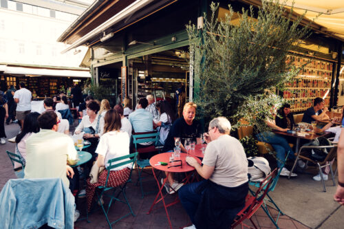 Atmospheric restaurant row at Vienna's Naschmarkt.