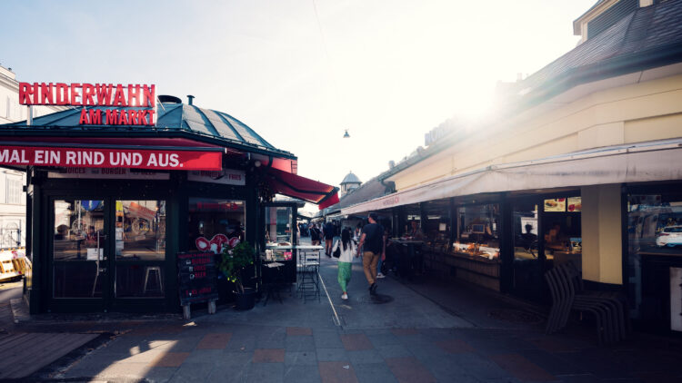 The distinctive Art Nouveau market stalls at Naschmarkt, designed during the 1910s, showcase Vienna's architectural heritage with their iron and glass construction.