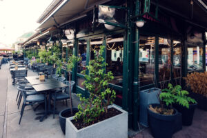 Atmospheric restaurant terrace at Vienna's historic Naschmarkt.
