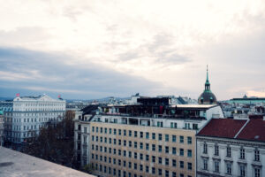 Vienna's blend of Baroque and modern architecture visible from Atmosphere Rooftop Bar.