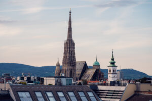 Atmosphere Rooftop Bar Vienna, panoramic view of St. Stephen's Cathedral and city skyline.