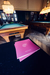 Traditional menu card at Café Sperl displaying classic Viennese coffee house offerings and house specialties.