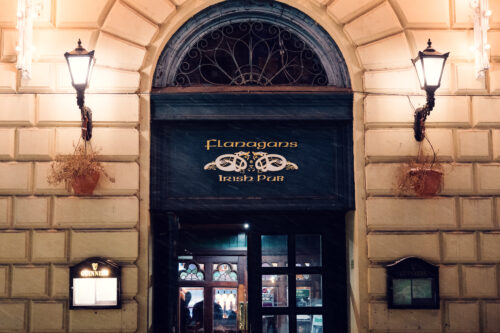 Historic entrance of Flanagan's Irish Pub in Vienna's city center.