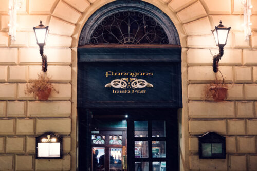 Historic entrance of Flanagans Irish Pub in Vienna's city center.