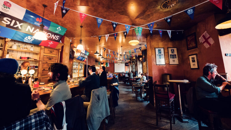 Flanagans creates authentic sports viewing experience with dedicated viewing areas and proper pint service.