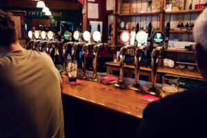 Authentic Irish pub atmosphere at Flanagans Vienna, where dark wooden interiors and traditional decor create genuine Celtic ambiance.