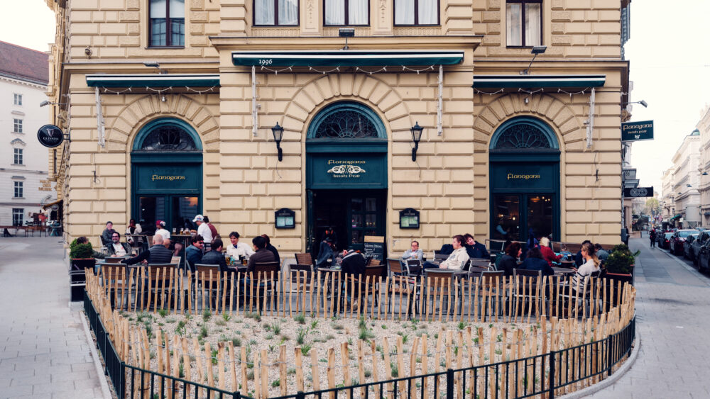 Terrace at Flanagans Irish Pub, where traditional pub furniture creates perfect outdoor atmosphere in Vienna's historic center.