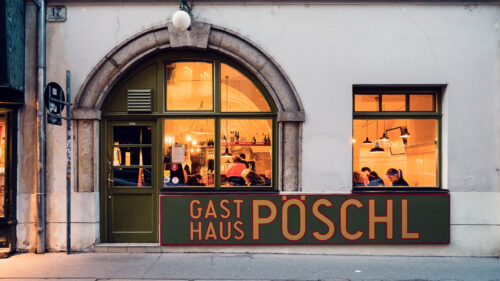 Historic entrance of Gasthaus Pöschl in Vienna.