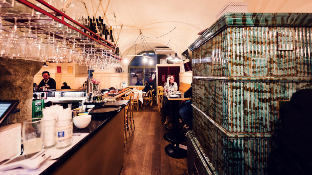 Historic interior at Gasthaus Pöschl, where wooden paneling and traditional furnishings create authentic atmosphere.