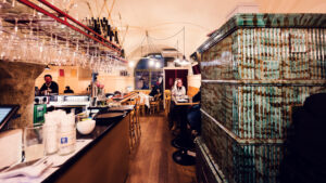 Historic interior at Gasthaus Pöschl, where wooden paneling and traditional furnishings create authentic atmosphere.