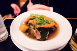Expertly cooked Tafelspitz beef at Gasthaus Pöschl, where tender slices demonstrate traditional Viennese culinary mastery.