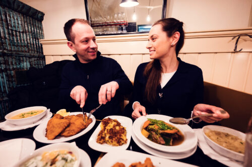 Adriana and Mario enjoying authentic Viennese cuisine in intimate setting.