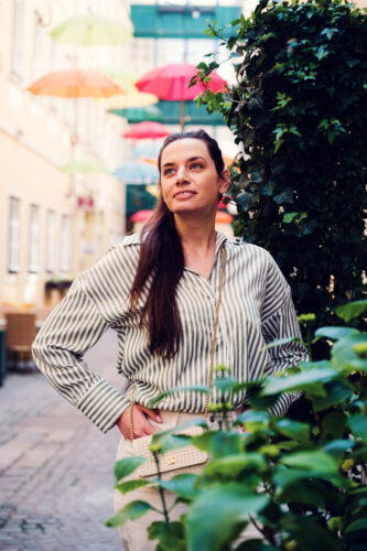 Photo-worthy corner at Sünnhof where umbrellas meet historic architecture.