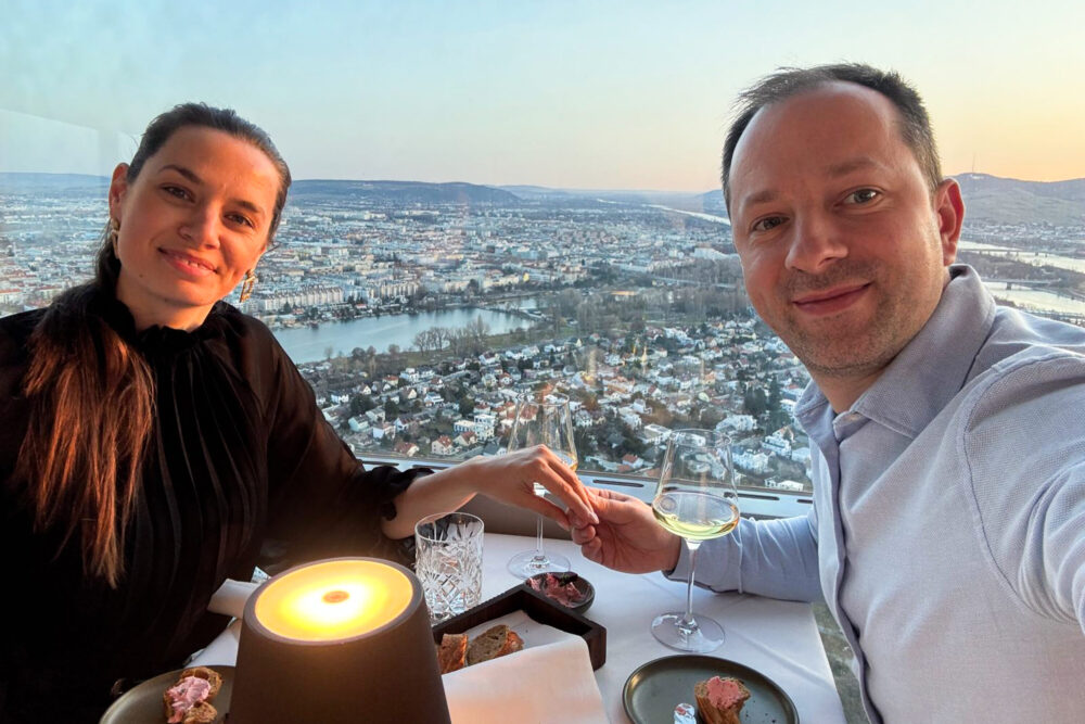 Muvamo's Adriana and Mario at Donauturm's revolving restaurant, 170 meters above Vienna.