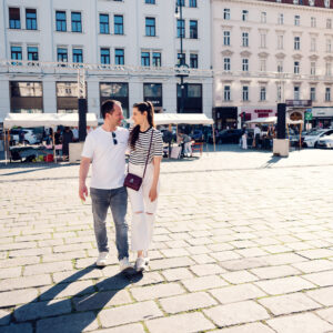 Adriana and Mario exploring Am Hof (Am Hof Square) Vienna during sunny weather.
