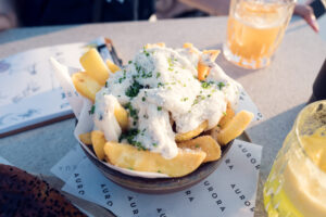 Crispy fries with truffle mayo sauce at Aurora Rooftop Bar Vienna.