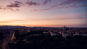 Evening sunset panorama from Aurora Rooftop Bar Vienna, elevated city views with warm golden light illuminating Vienna's architectural landmarks.