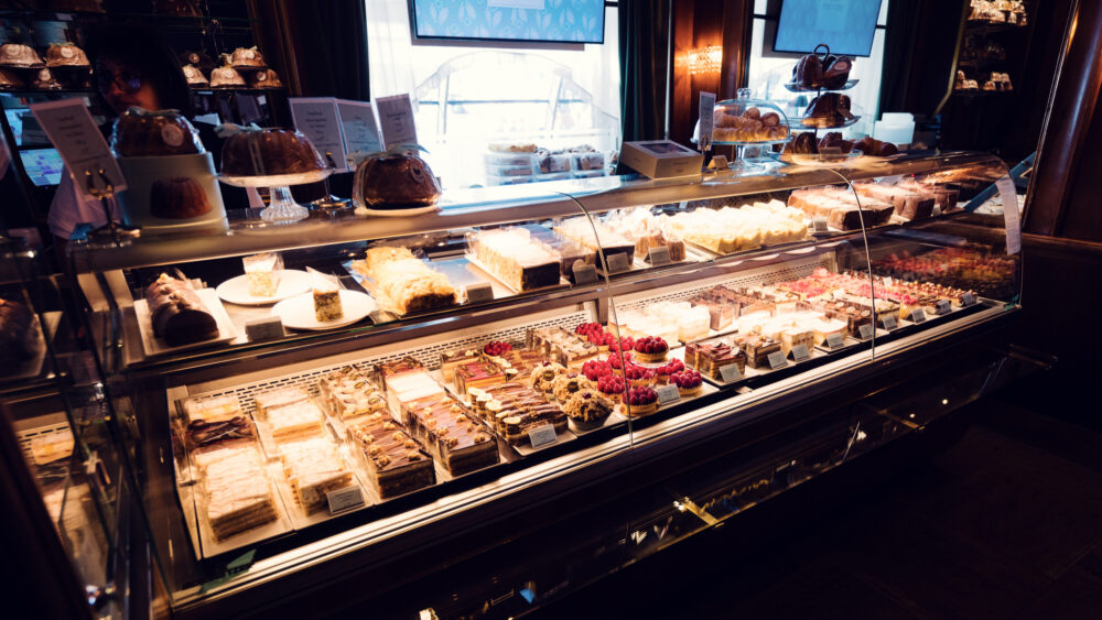 Café Landtmann's famous glass display case filled with homemade Viennese pastries and tortes.