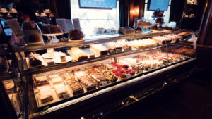 Café Landtmann's famous glass display case filled with homemade Viennese pastries and tortes.