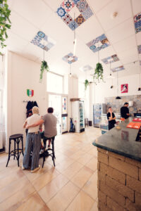 Dining room at Casolaro Bros Vienna with Mediterranean decor.
