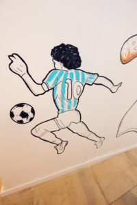 Hand-painted Neapolitan murals at Casolaro Bros Vienna.