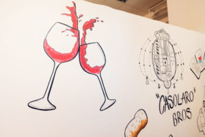 Modern art at Casolaro Bros Vienna showcasing local artists' interpretations of Italian culinary culture.