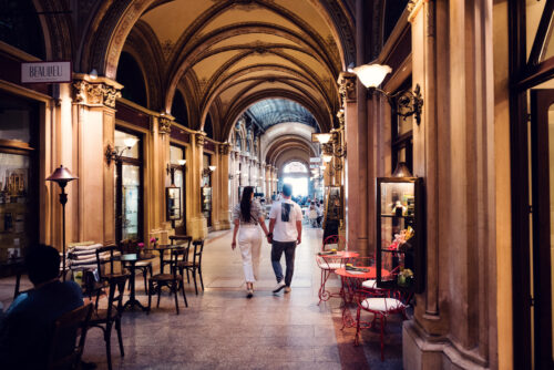 Adriana and Mario at Ferstl Passage Vienna with classical Viennese design elements.