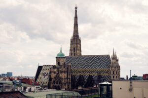 View from Lamee Rooftop Bar Vienna showing St. Stephen's Cathedral's iconic 111-meter-long glazed tile roof with its distinctive zigzag pattern.