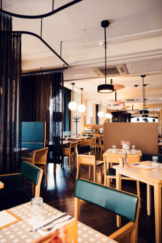 Lugeck Figlmüller´s indoor seating, authentic Austrian restaurant interior with traditional decor and warm hospitality atmosphere.