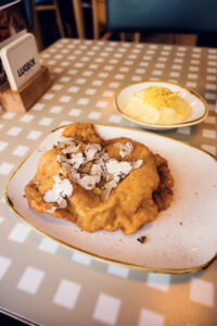 Wiener Schnitzel with truffle served at Lugeck Figlmüller restaurant Vienna.
