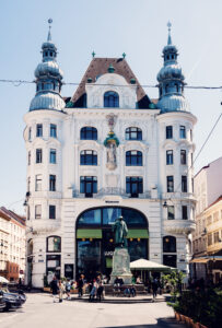 Lugeck Figlmüller´s exterior facade in Vienna's historic city center, traditional Austrian architecture with classic signage.