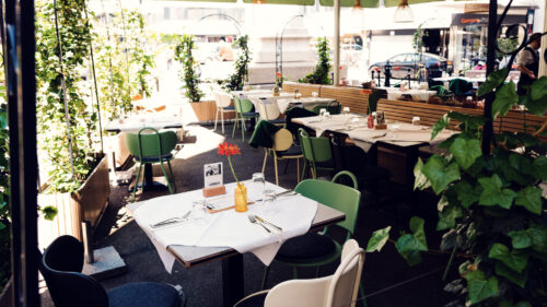 Outdoor terrace at Lugeck Figlmüller restaurant Vienna Austria.
