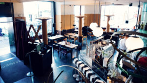 Traditional dining room at Lugeck Figlmüller, classic Austrian interior with wooden furniture and cozy restaurant atmosphere.