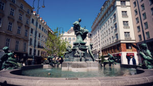 Donnerbrunnen Providence Fountain at Neuer Markt Vienna, baroque fountain by Georg Raphael Donner with Providentia figure and four river gods.