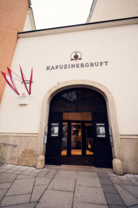 Kapuzinergruft Imperial Crypt Vienna entrance at Neuer Markt, baroque underground burial site of Habsburg dynasty with ornate sarcophagi.