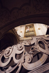 Palais Kinsky Vienna baroque interior showing ornamental ceiling frescoes and classical Austrian Habsburg palace elements.