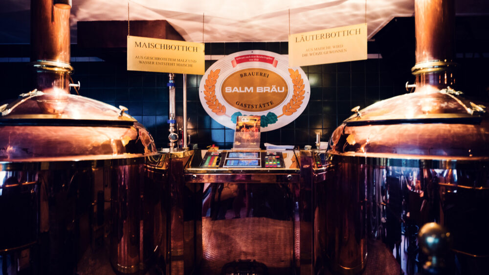 The gleaming copper brewing vessels at Wiener Salm Bräu.