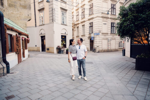 Adriana and Mario walking through Vienna First District Innere Stadt historic city center streets.