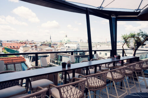Panoramic city view from Lamee Rooftop Bar in Vienna.