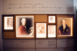 Mozarthaus lighting highlighting historical artifacts and documents.