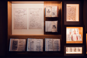 Mozarthaus Wien interior displaying historical documents and musical manuscripts.