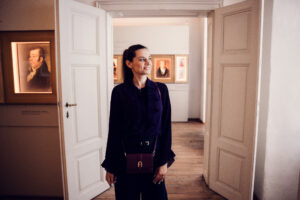 Adriana at Mozarthaus corridor connecting different exhibition rooms.