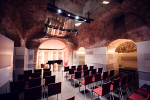 Mozarthaus Vienna basement concert room with period acoustics where classical music performances recreate Mozart's 18th century musical atmosphere.