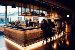 Stylish bar counter with Middle Eastern inspired design at Neni am Prater.