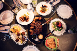 Traditional oriental dinner table with fresh ingredients at Neni am Prater.