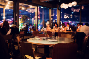 Modern Middle Eastern restaurant interior with warm lighting at Neni am Prater.