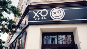 XO Grill Neubaugasse restaurant logo and branding elements.