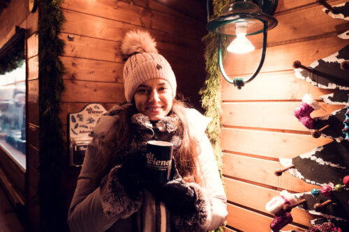 Adriana at Glühwein and Punsch stand at Freyung Christmas market.