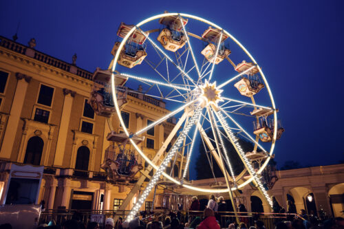 Christmas market carousel in forecourt of Schönbrunn Palace (Schloss Schönbrunn).